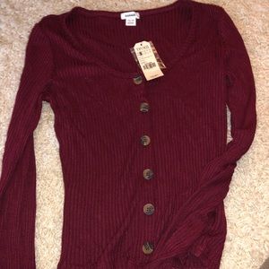 maroon button down shirt